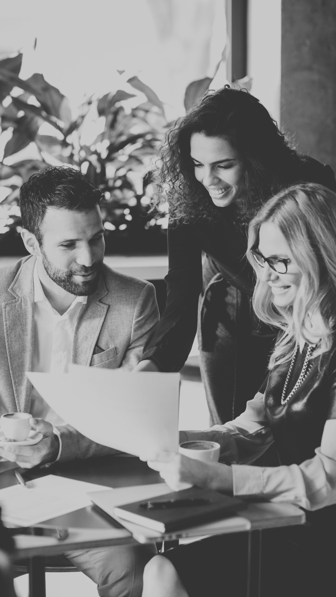 Business colleagues around a desk